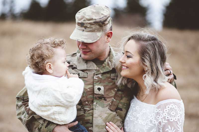 military couple and their young baby